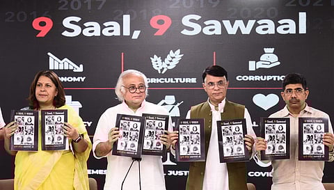 Congress Leader Jairam Ramesh releasing the '9 saal, 9 sawaal' booklet at AICC HQ in New Delhi. (Photo | Parveen Negi)