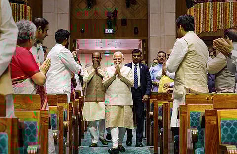 Prime Minister Narendra Modi arrives in the Lok Sabha chamber of the new Parliament building, in New Delhi, May 28, 2023. (Photo | PTI)