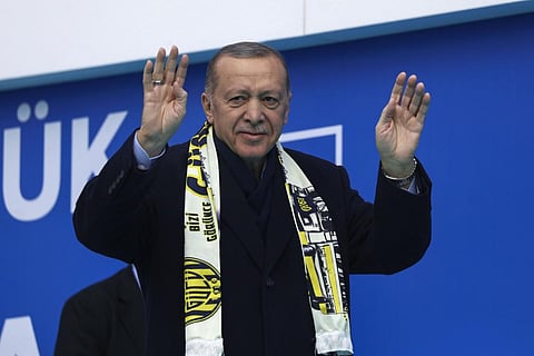 Turkish President and People's Alliance's presidential candidate Recep Tayyip Erdogan gestures to supporters during an election campaign rally in Ankara, April 30, 2023. (Photo | AP)