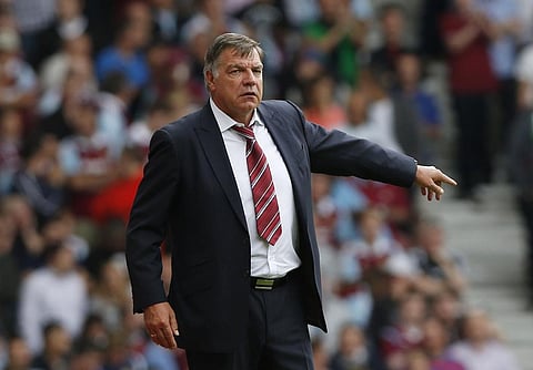 West Ham United's manager Sam Allardyce reacts as he watches his team play against Cardiff City during their English Premier League soccer match at Upton Park, London. (Photo | AP)