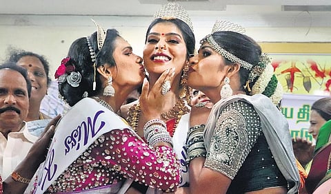 A Niranjana (centre) from Chennai won the Miss Koovagam title.  G Disha and E Sadhana were the first and second runners-up | R Sriram