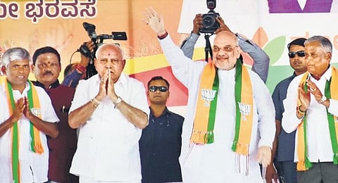 Union Home Minister Amit Shah along with former CM BS Yediyurappa and BJP’s Varuna candidate V Somanna at a campaign in Mysuru on Tuesday | Udayashankar S