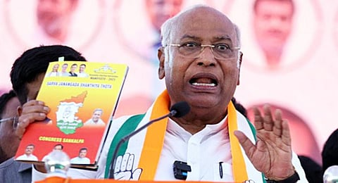 Congress President Mallikarjun Kharge addresses the gathering during a public meeting for the Karnataka Assembly election.(Photo | ANI)