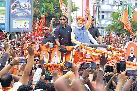 PM Modi during his road show in Bengaluru on May 6, 2023. (Photo | Shashidhar Byrappa, EPS)
