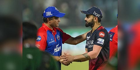 RCB player Virat Kohli with former cricketer Sourav Ganguly after the IPL 2023 cricket match against Delhi Capitals at the Arun Jaitley Stadium in New Delhi, May 6, 2023. (Photo | PTI)