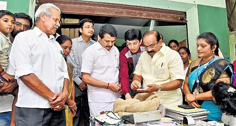 Food Minister R Sakkarapani and Electricity Minister V Senthil Balaji at ration shop in Coimbatore on Saturday | Express