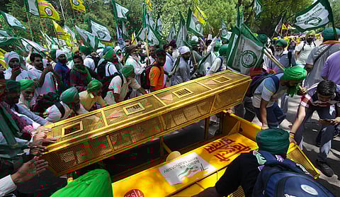 Farmers break police barricade as they arrive to join wrestlers protesting at Jantar Mantar, in New Delhi, Monday, May 8, 2023. (Photo | Shekhar Yadav)