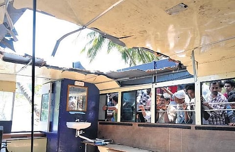 Local residents in Tanur taking a look at the boat that met with the accident  on Sunday | E Gokul