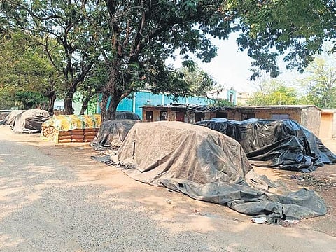 Paddy bags lying unsold at a market yard in Attabira | Express
