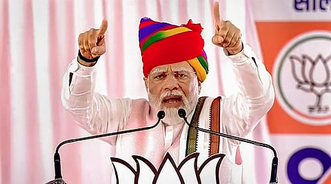 Prime Minister Narendra Modi speaks during a public meeting in Ajmer. (Photo | PTI)