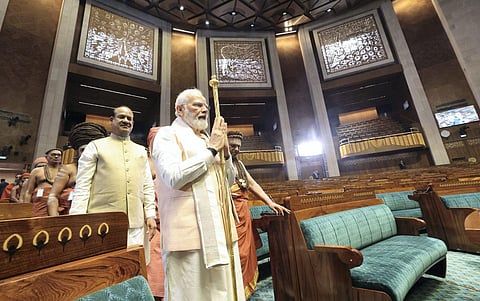 Prime Minister Narendra Modi carries the 'Sengol' in a procession during the inauguration of the new Parliament building, in New Delhi, Sunday, May 28, 2023. (Photo | PTI)