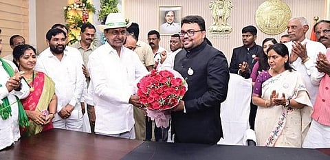 Chief Minister K Chandrasekhar Rao presents a bouquet to Mancherial Collector  B Santhosh after inaugurating the Integrated Collector office building on Friday