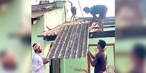 Workers dismantling the roof of Bahanaga High School I Express