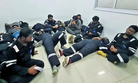 FILE - The Indian crew members of the Norway-based ship ‘MT Heroic Idun’ in the small room where they are being held by the Nay of Equatorial Guinea.