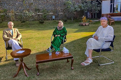 FILE - PDP chief Mehbooba Mufti interacts with JK National Conference President Farooq Abdullah and leader Omar Abdullah at her residence in Srinagar, Oct 14, 2020. (Photo | PTI)