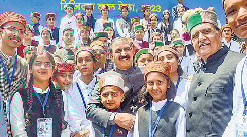 Himachal Pradesh CM Sukhvinder Singh Sukhu with ‘children legislators’ in Shimla on Monday. (Photo| PTI)