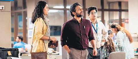 A still from the Netflix series Scoop