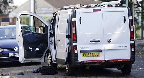 A white van believed to be used by the suspect is seen on the corner of Maples Street and Bentinck Road after three people were killed in Nottingham city center. (Photo | AP)