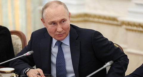 Russian President Vladimir Putin meets with war correspondents in Moscow. (Photo | AFP)