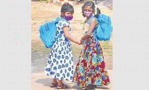 Students with Jagananna Vidya Kanuka kits at a government school in Visakhapatnam I G Satyanarayana