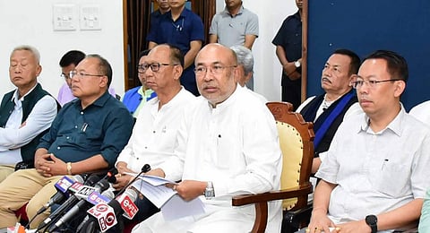 Manipur Chief Minister N Biren Singh with others addresses the media at Darbar Hall of Chief Minister's Secretariat, in Imphal. (Photo | PTI)