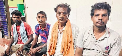 Lalan Sharma (second from right) and other family members of train crash victims waiting for DNA reports at a guest house in Bhubaneswar | Express