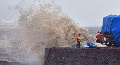 High tides crash at the sea front at Colaba, ahead of cyclone Biparjoy's landfall in Kutch, in Mumbai. (Photo | PTI)