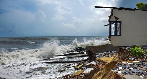 High tides crash at the damaged houses due to sea erosion, at Bettampady, ahead of Cyclone Biparjoy, on the outskirts of Mangaluru. (Photo | PTI)