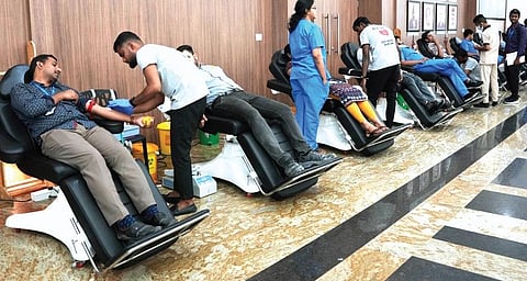 People donate blood at AIG Hospital on Wednesday. The hospital pledged to donate 1000 units of blood every year to thalassemia and sickle cell patients