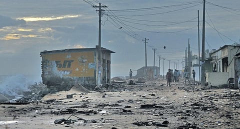 The road that was destroyed by sea erosion at Pozhiyoor | b p Deepu