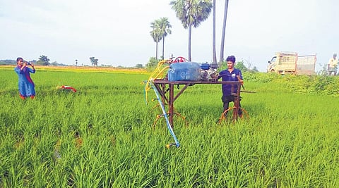 Ashok Gorre teaches farmers how to operate his innovations at his native village in Suryapet district.