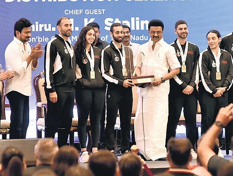 TN CM MK Stalin (C) handing away the trophy to Egpyt players in Chennai. Also seen in the picture is TN sports minister Udhayanidhi Stalin (L) | P Jawahar