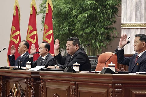 North Korean leader Kim Jong Un, center, attends an enlarged plenary meeting of the ruling Workers’ Party’s Central Committee at the party's headquarters. (Photo | AP)