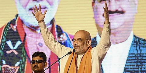 Union Home Minister Amit Shah addresses a party rally in Sirsa on Sunday. (Photo | PTI)