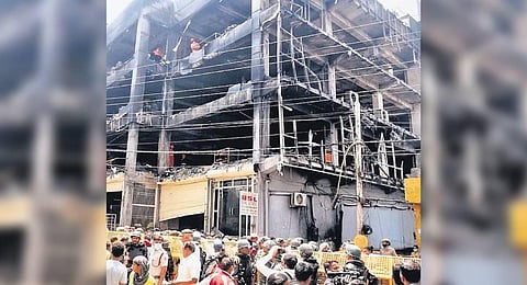 A massive fire broke out at a five-storeyed building in Mundka. Nearly 120 people were trapped and 27 succumbed to injuries. (Photo | EPS)