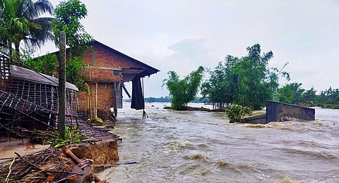Several houses damaged as the flood water makes its way, in Lakhimpur district.(Photo | File ,PTI)