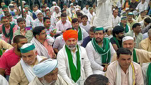 Farm leader Rakesh Tikait addresses a Khap 'Mahapanchayat' organised over the ongoing protest by wrestlers against WFI President in Muzaffarnagar, Thursday, June 1, 2023. (Photo | PTI)