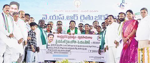 Chief Minister YS Jagan Mohan Reddy releases `3,923.21 crore to 52,30,939 farmers as the first tranche of financial assistance under the YSR Rythu  Bharosa - PM Kisan scheme at Pattikonda in Kurnool d