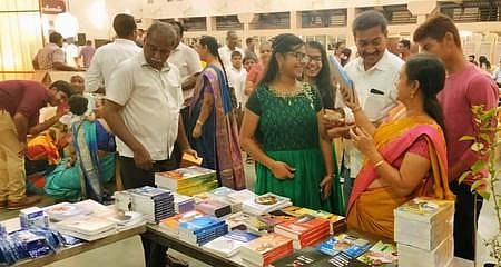 Guests who came to wish Swarna Prabha and M K Thiruvikram at the Ayyappa Seva Sangam marriage hall in Ramanagar on Wednesday brought books as gifts | Express