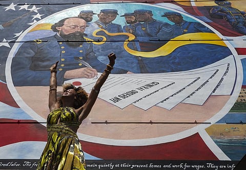Dancer Prescylia Mae performs in Galveston, Texas, on June 19, 2021, to mark Juneteenth, the day that enslaved Black Americans learned they were free. (AP)