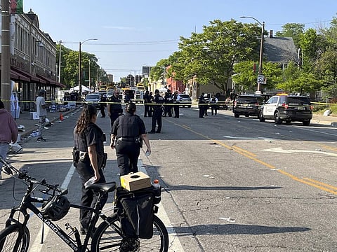 Milwaukee police investigate a shooting along North King Drive near Locust Street, in Milwaukee. (Photo |AP)