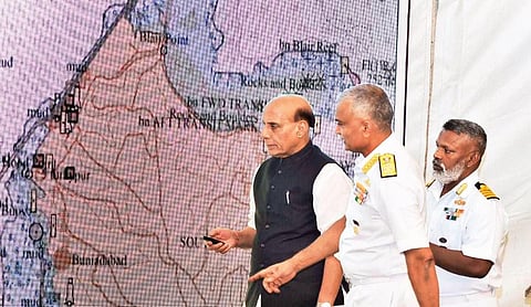 Defence Minister Rajnath Singh releasing  the hydrography map on the occasion of World Hydrography Day at Kochi Naval Base on Tuesday. Chief of Naval Staff Admiral R Harikumar is also seen | A Sanesh