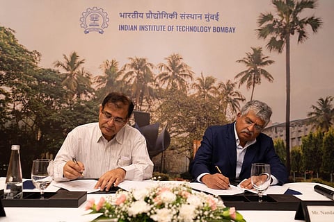 Infosys co-founder Nandan Nilekani and IIT Bombay Director Prof Subhasis Chaudhuri sign an MoU in Bengaluru.