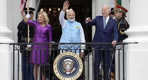 First lady Jill Biden, Prime Minister Narendra Modi and President Joe Biden waves from the Balcony of the White House.(Photo | PTI)