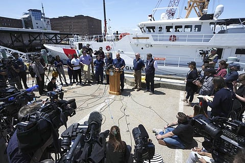 US Coast Guard Capt. Jamie Frederick, center at microphone, faces reporters during a news conference, Wednesday, June 21, 2023, at Coast Guard Base Boston, in Boston. (Photo | AP)