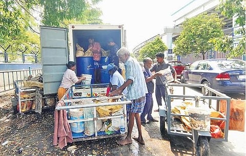 Haritha Karma Sena workers handing over biowaste collected from Kaloor to a private agency entrusted by Kochi corporation for waste management | File pic