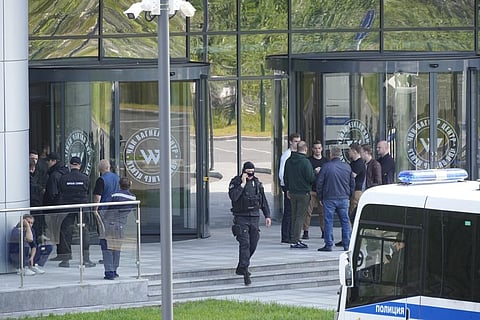 Policemen guard an area near an office of the 'PMC Wagner Centre', which is associated with the owner of the Wagner.(Photo |AP)