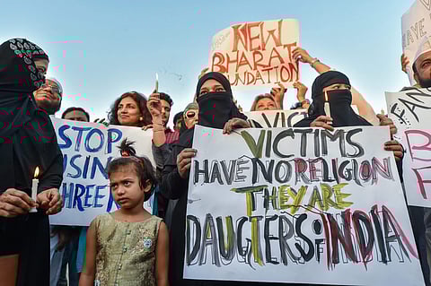 People take part in a candlelight march at the India Gate in protest over Kathua gangrape case in New Delhi. (File Photo | PTI)