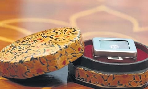 The papier-mâché box that had the laboratory-grown diamond