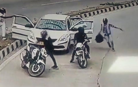 Motorcycle-borne robbers loot a delivery agent and his associate inside the Pragati Maidan tunnel at gunpoint, in New Delhi, Saturday, June 24, 2023. (Photo | PTI)